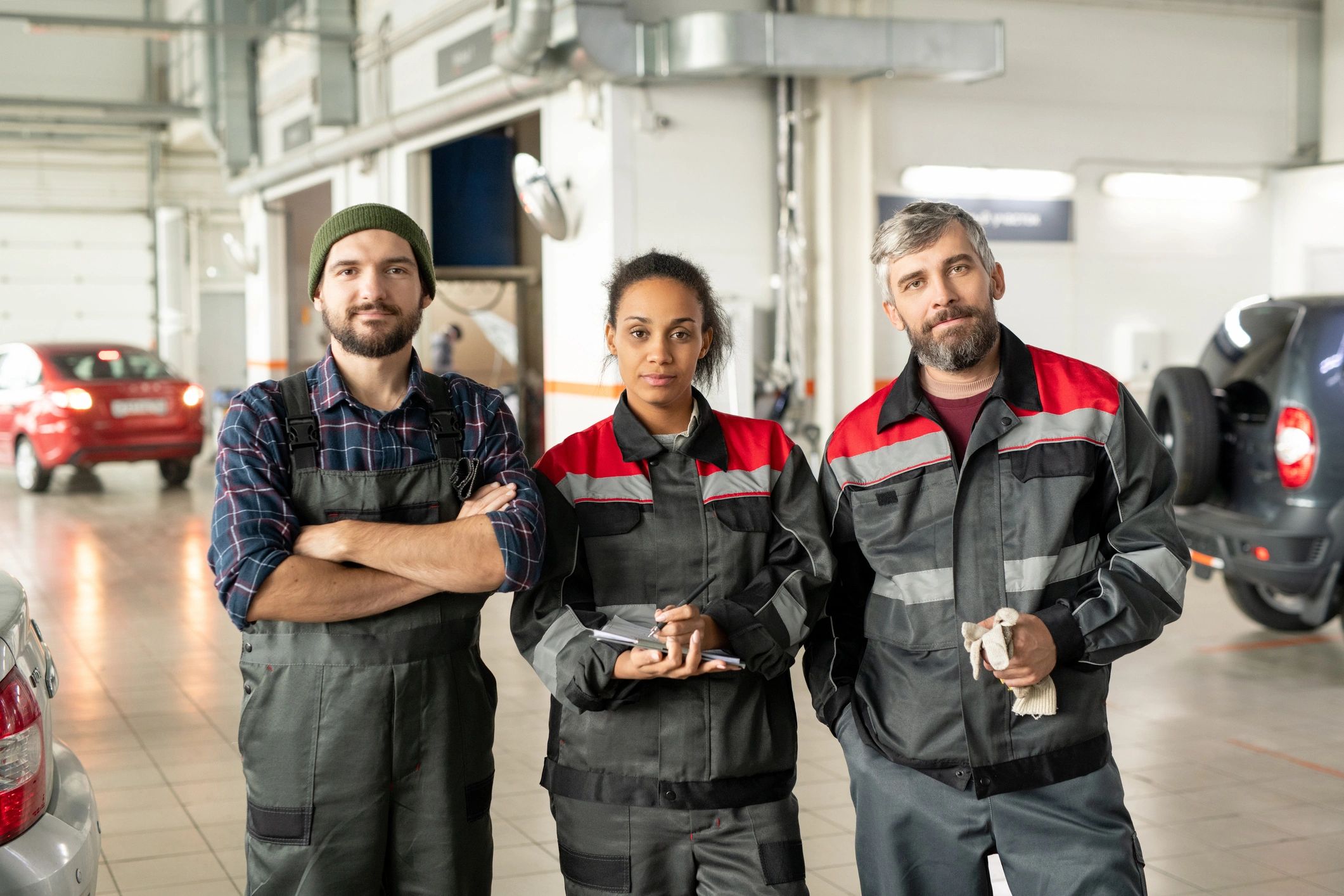 Technicians standing inside a large workshop