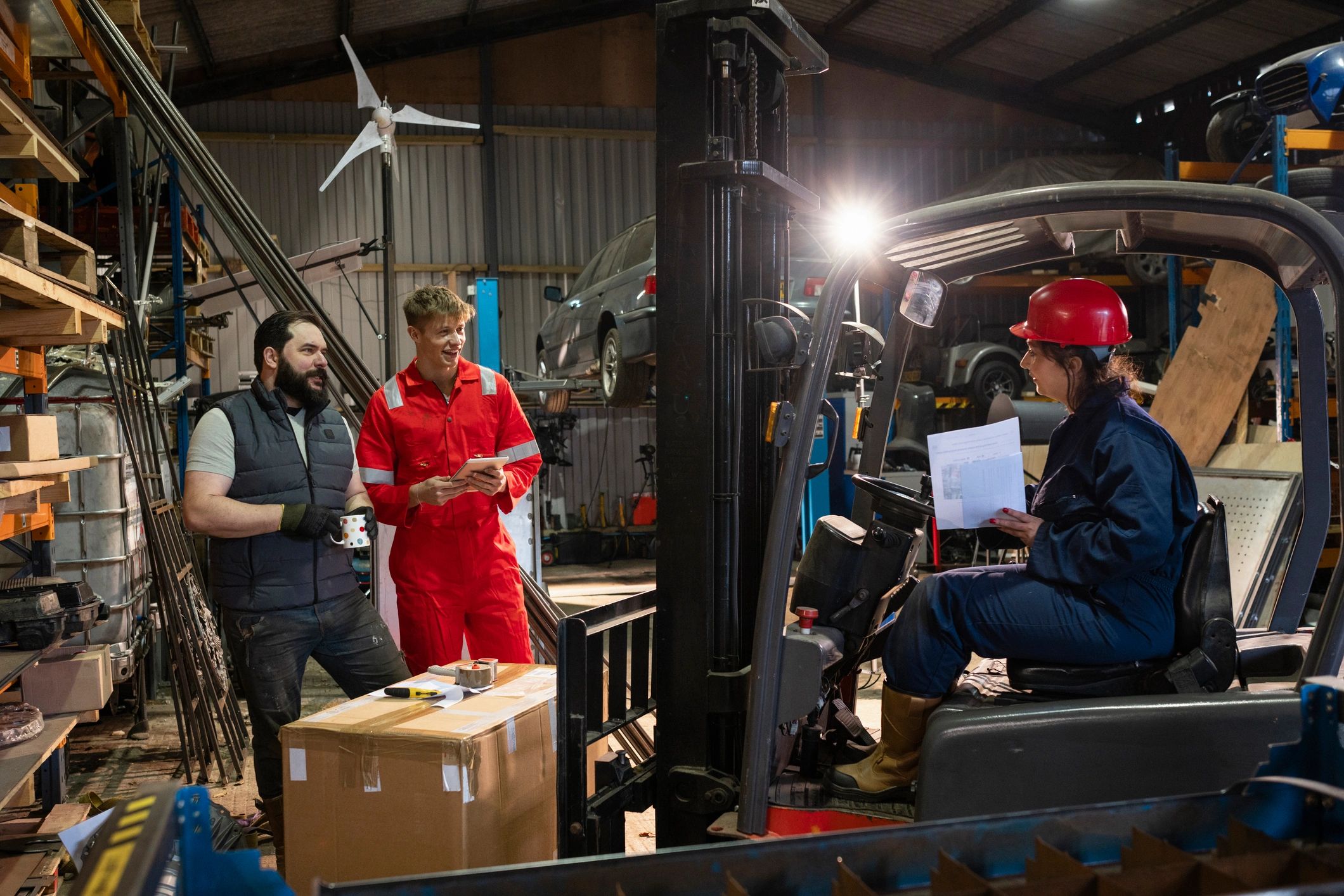 Auto shop interior with vehicles being serviced
