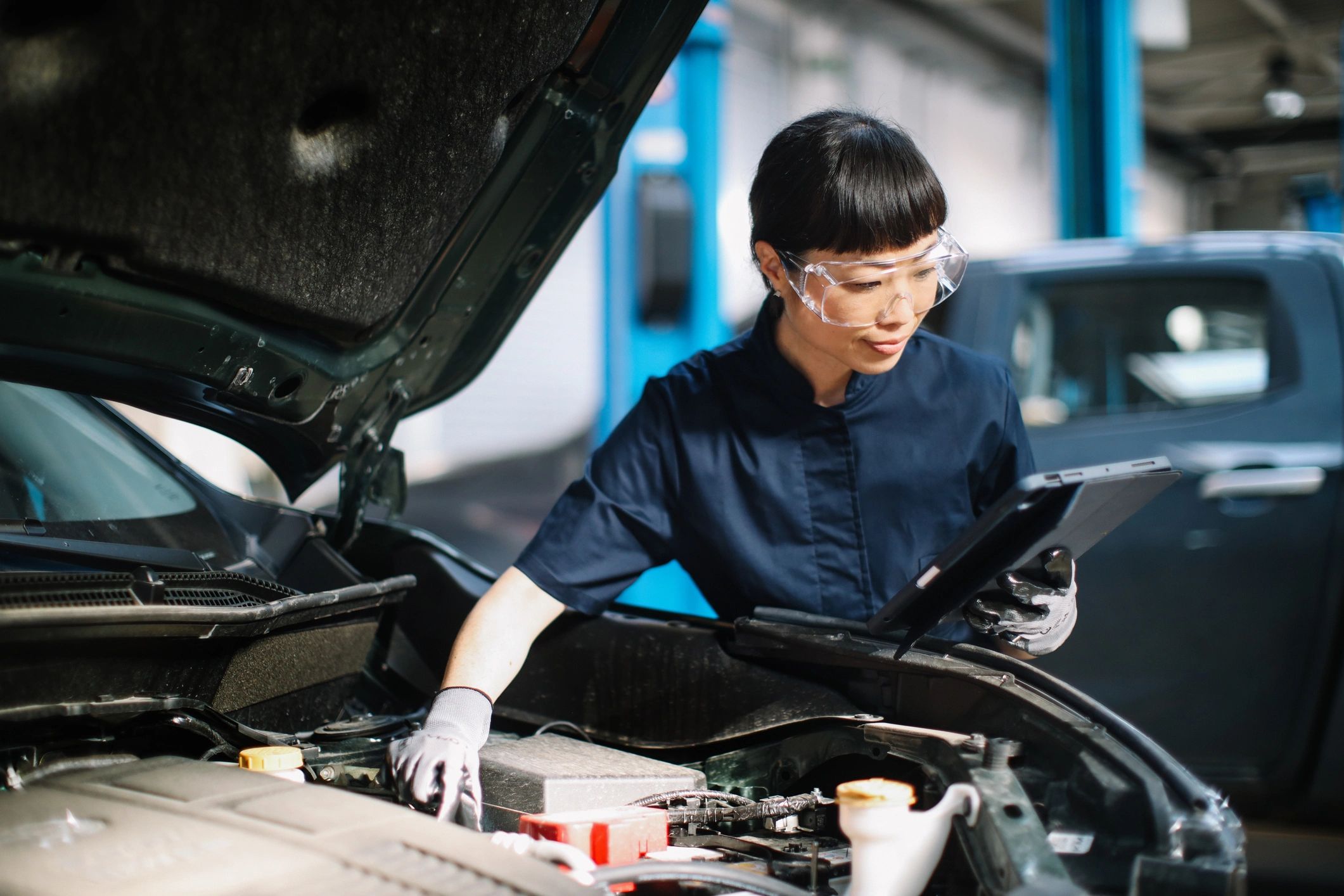 Vehicle inspection in progress at an auto shop